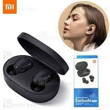 A pair of compact wireless earbuds resting inside their sleek charging case, designed for portable and high-quality audio listening